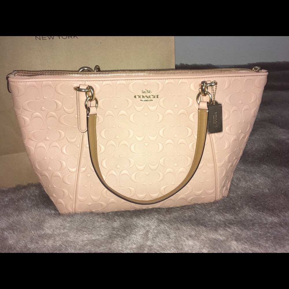 SOLD!COACH embossed “Ava Tote” in nude pink